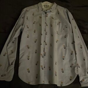 Large button up shirt from Hackings McGill with smoking fox printed on it.